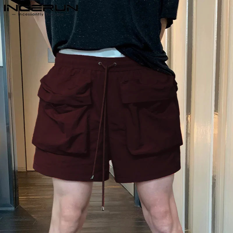 INCERUN 2024 Shorts im koreanischen Stil Neue Shorts für Herren mit großen Taschen und Kordelzug-Design Casual Streetwear Solide Persönlichkeit Shorts S-5XL